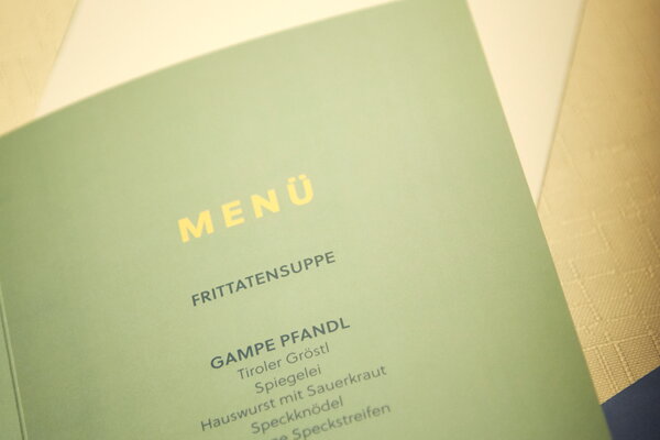 Incentive Sölden Speisekarten mit den Titeln "Menü" und typischen Gerichten wie "Kaiserschmarrn"